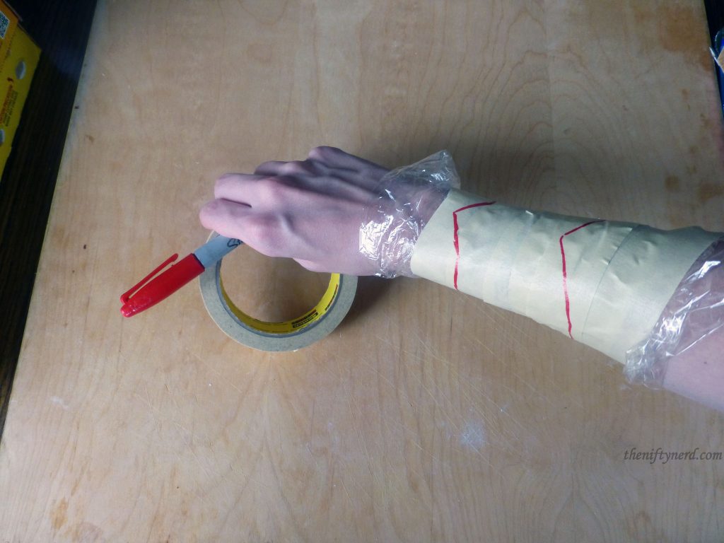 creating armor patterns from cling wrap and masking tape