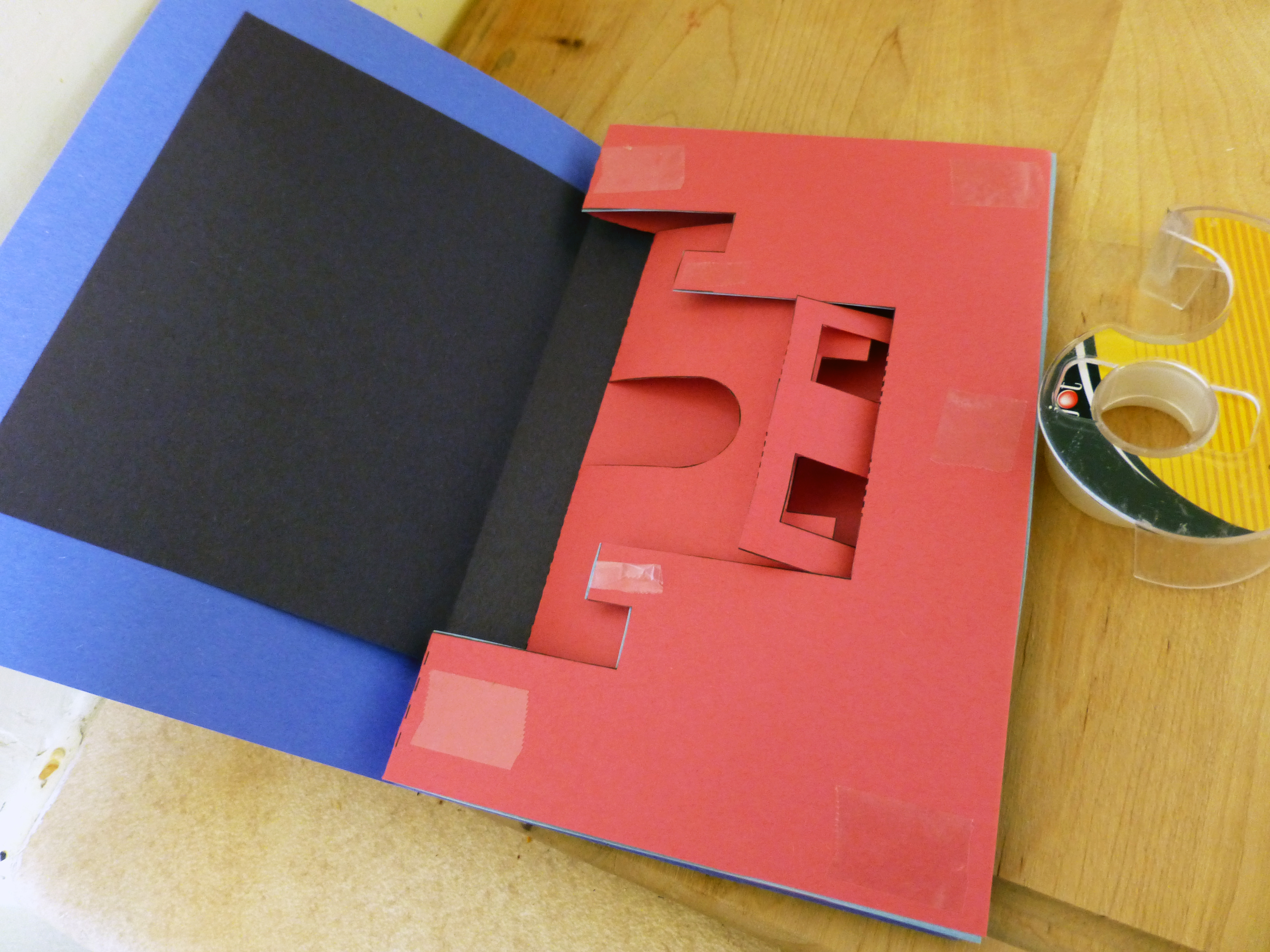 securing the popcard inside to the outside