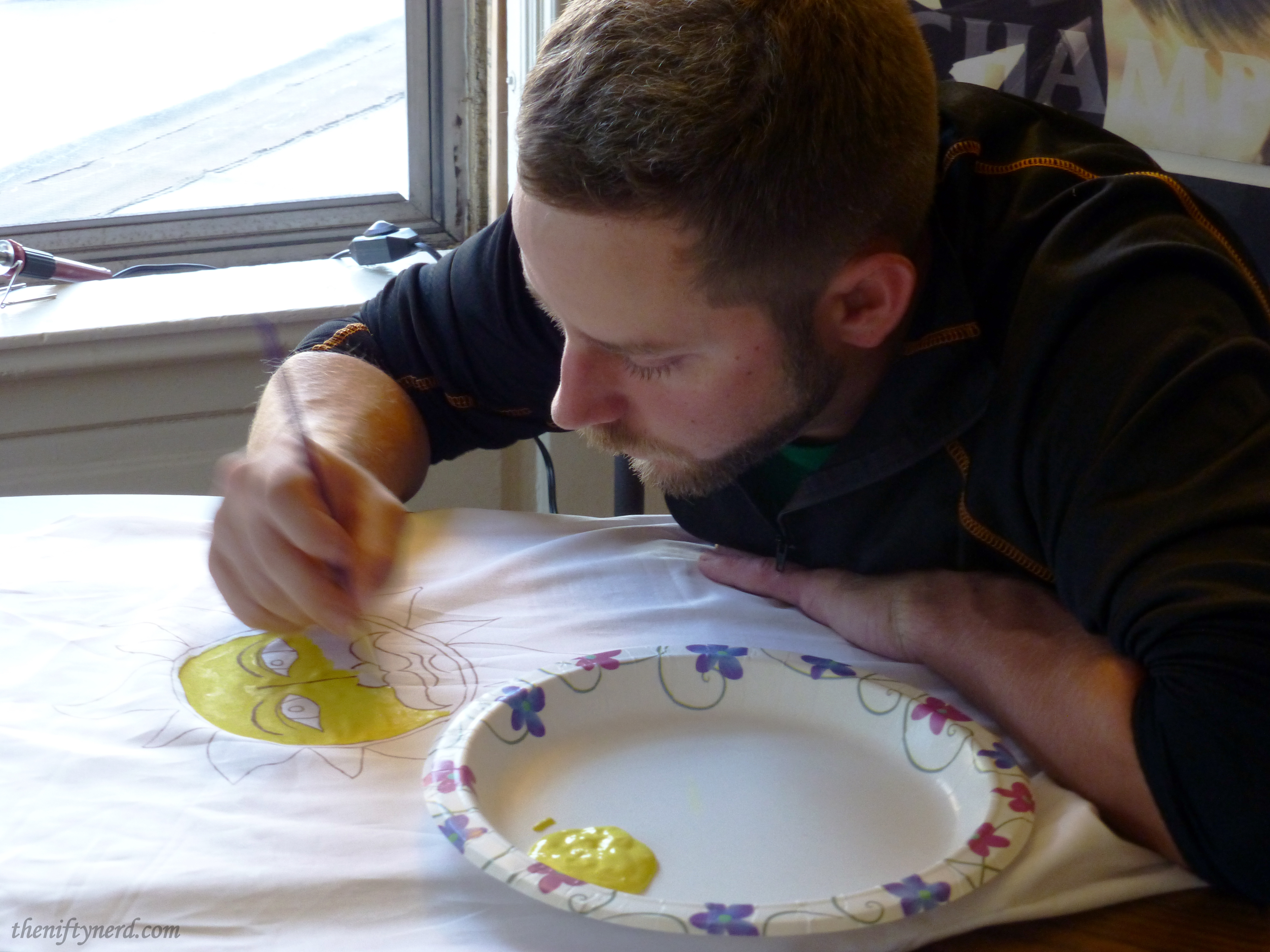 painting the sun emblem