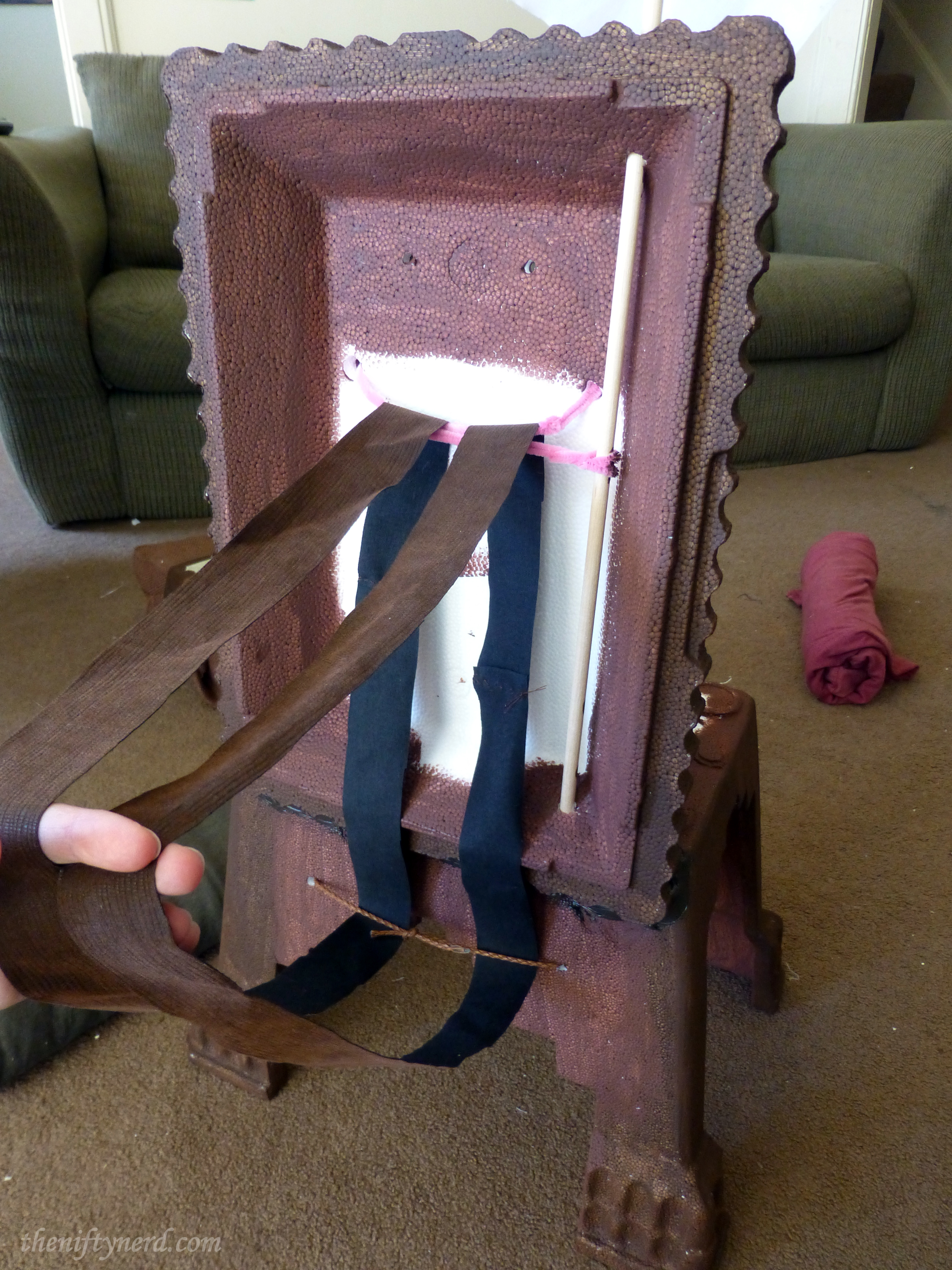 adding backpack straps and the flag to Patsy's chair